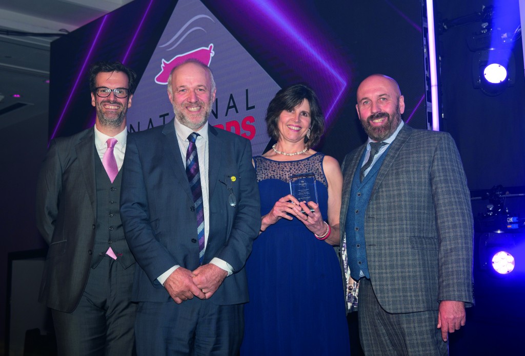 Stephen and Karen, centre, received their award from Simon Davies, Meadow Quality's commercial director, right, and host Marcus Brigstocke, left