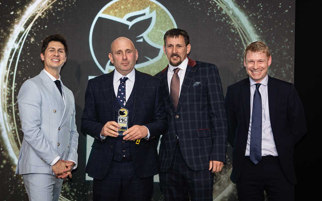Richard Mellor and Lee Hewitt, who manages Warren Farm, received the Outdoor Producer of the Year award from Tom Welham (right), commercial director at ForFarmers, and awards host Ben Hanlin (left)