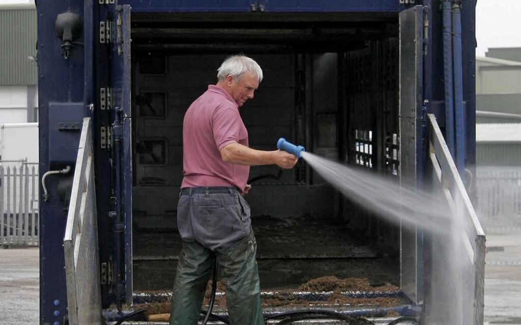 Man washing lorry
